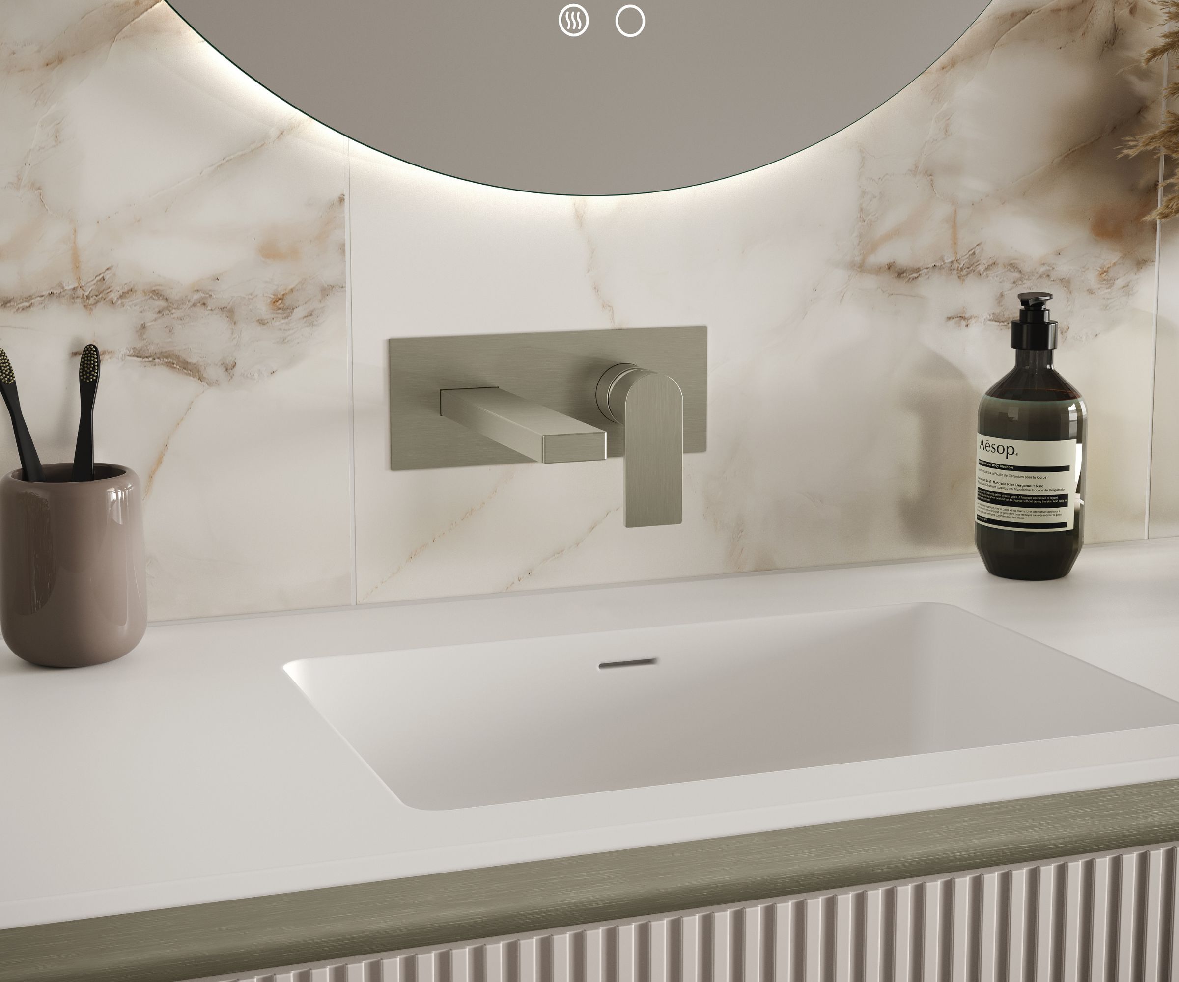 Wall-mounted brushed steel basin tap above a white vanity and marble-effect splashback.