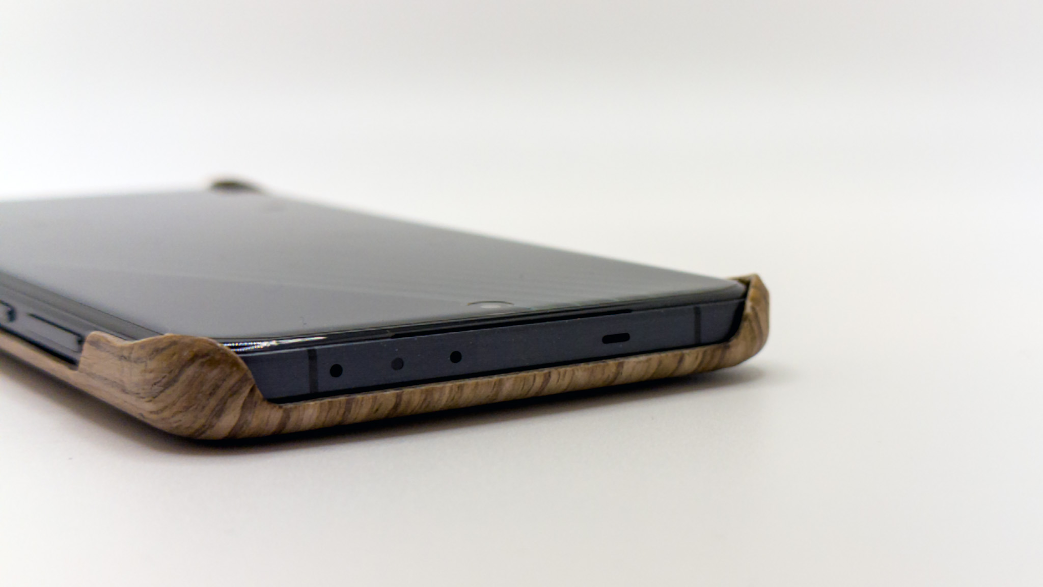 The official OnePlus 13 wood case from the top