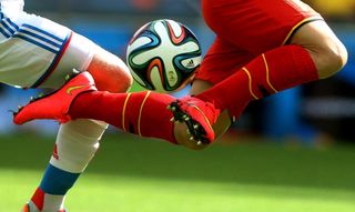  The official Adidas ball in action during a World Cup Soccer game on June 22, 2014 in Rio De Janeiro, Brazil. 