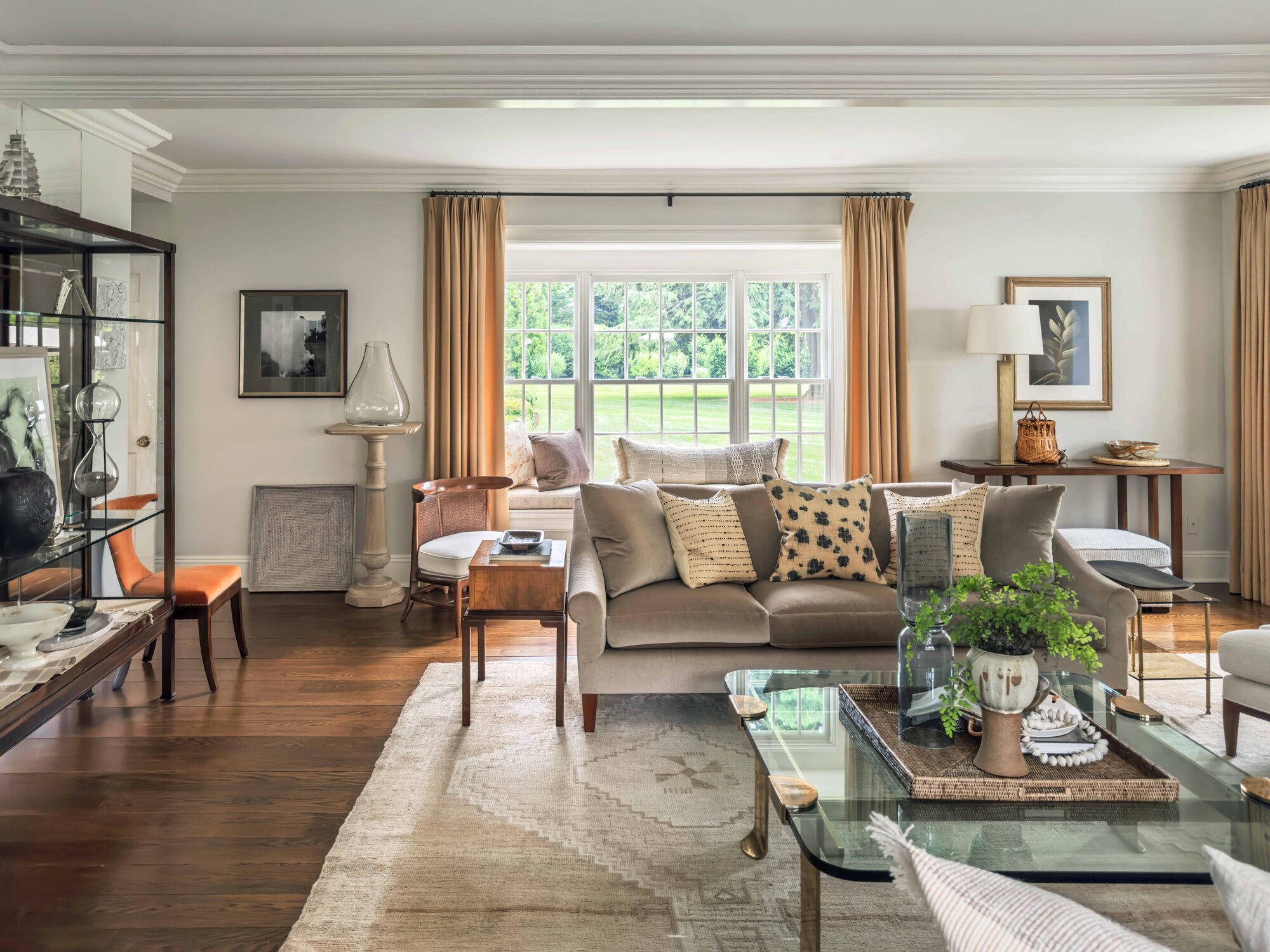 a living room with a mix of new and old furniture