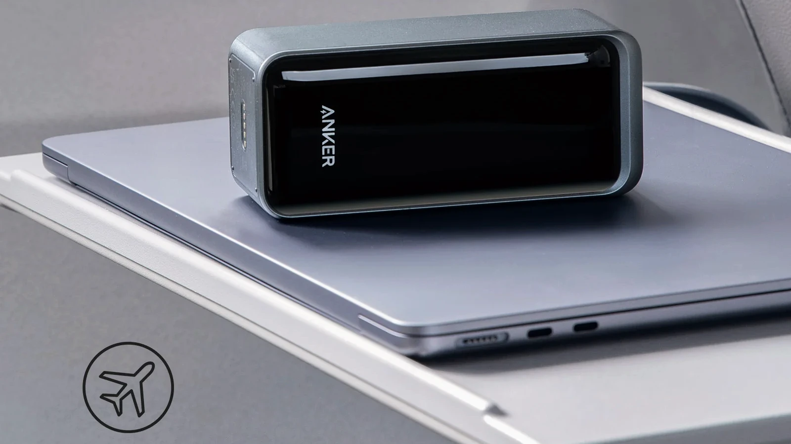 Anker airline safe power bank sitting on a laptop