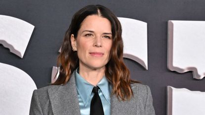 Neve Campbell at Scream 7 premiere on February 25, 2026 in Hollywood, California