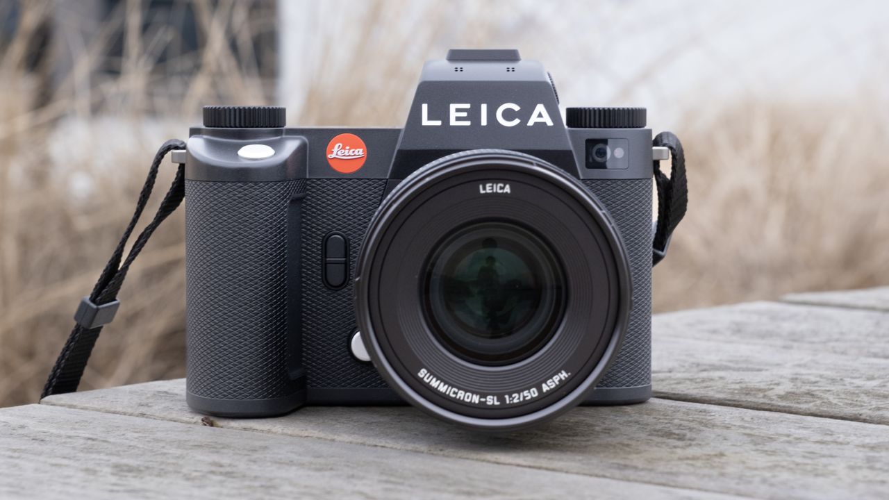 The Leica SL3 camera sat on a wooden bench