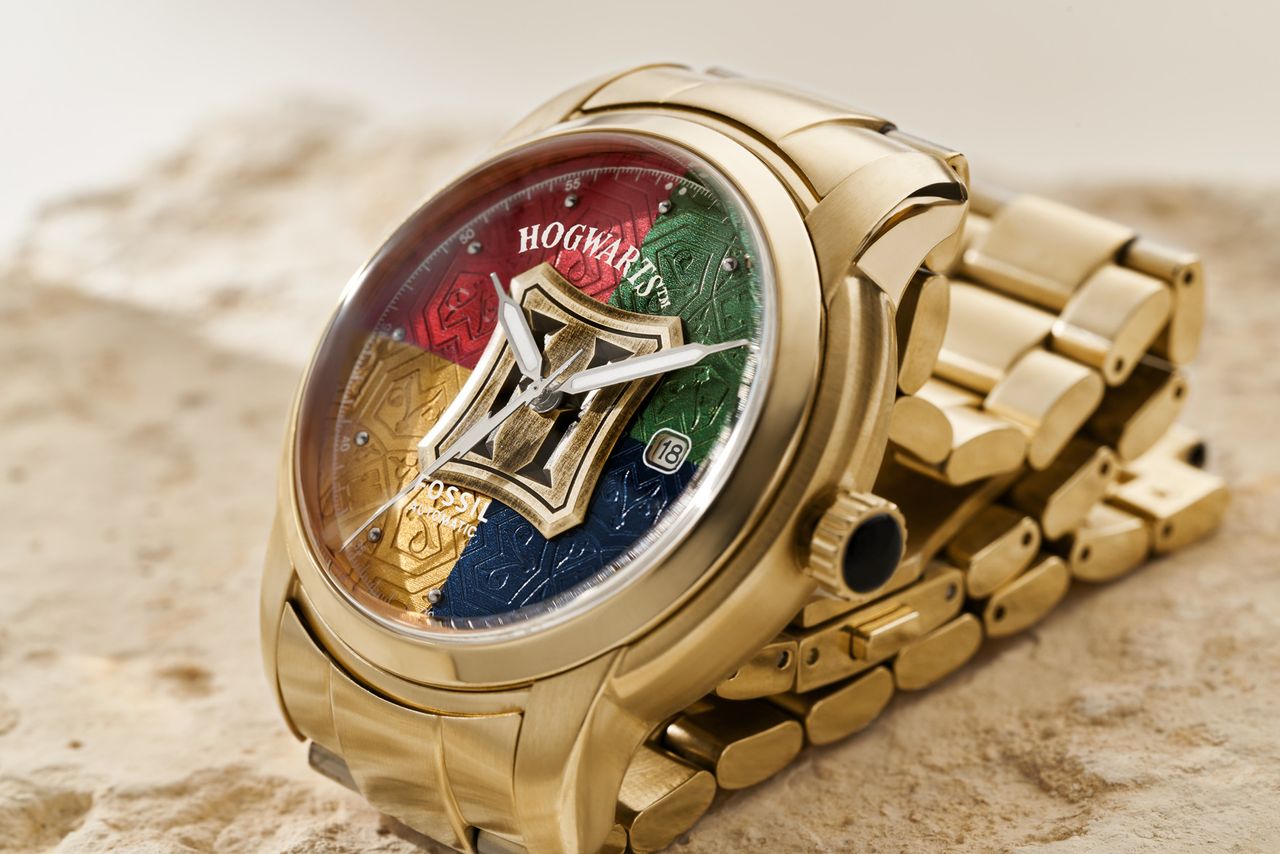 The Harry Potter x Fossil automatic watch perched on sandstone