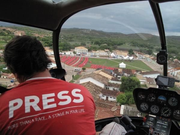The press get a ride in a helicopter.