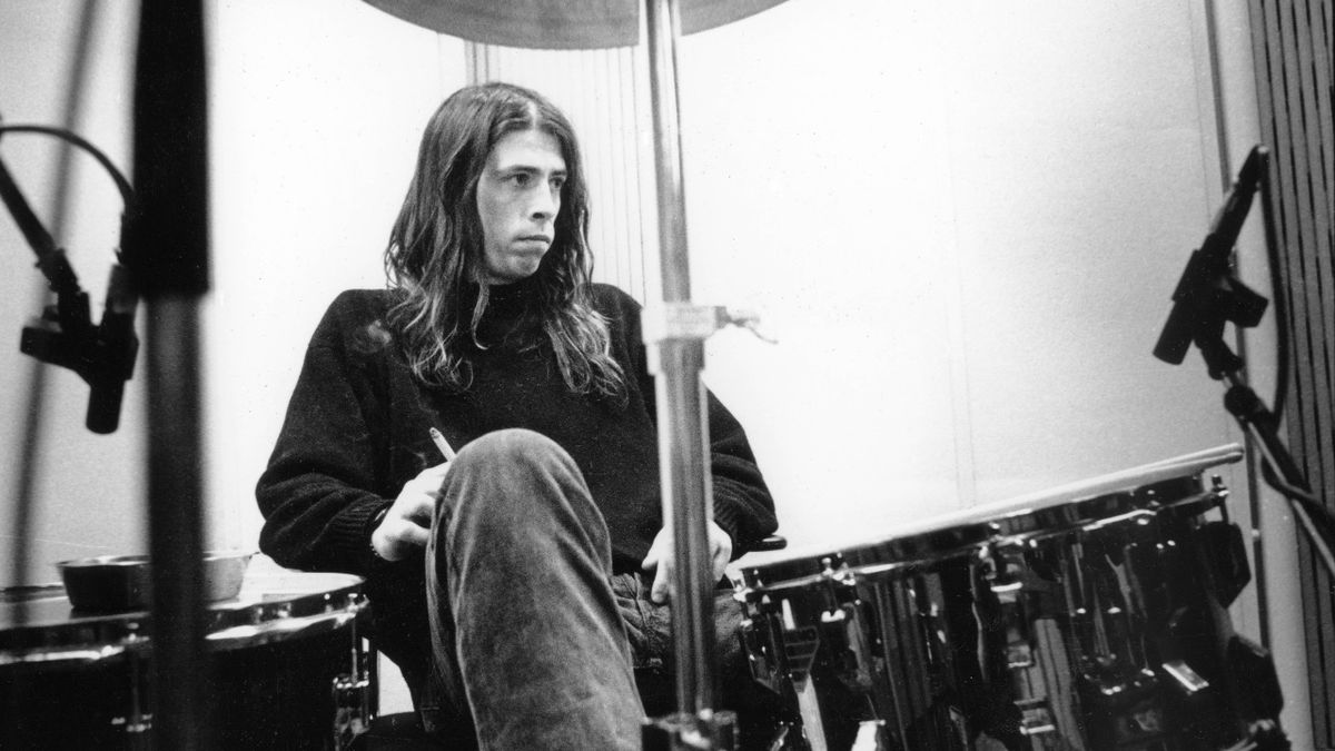 Dave Grohl recording in Hilversum Studios, posed at drums