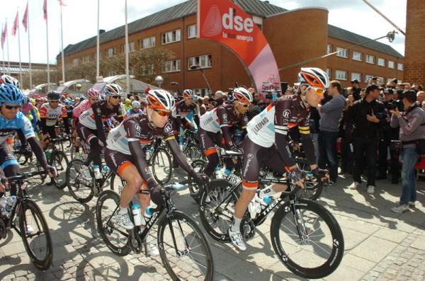 The RadioShack team lead the peloton over the start line on stage 3