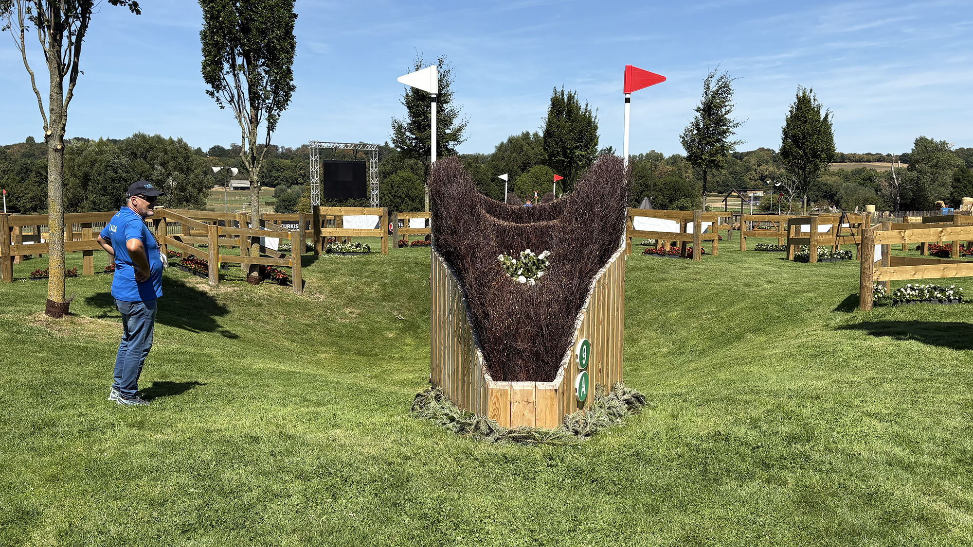 A triple brush arrowhead fence on the eventing World Championships cross-country course
