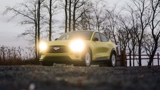 2024 Ford Mustang Mach-E Rally headlights on.