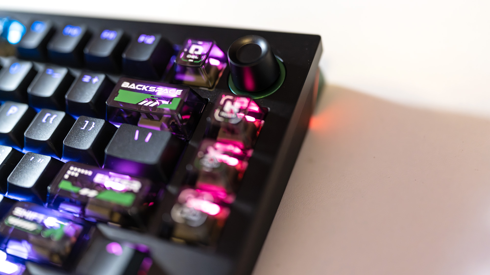 Lemokey L5 HE 8K gaming keyboard with RGB enabled on a desk.