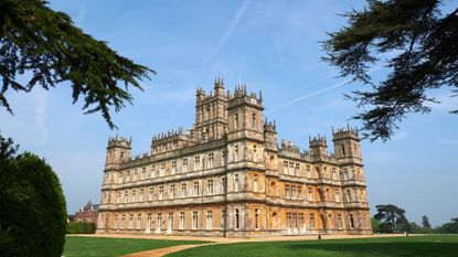 Highclere Castle, is pictured in Highclere, southern England, on May 12, 2016. As Britain mulls questions of identity and its possible exit from the European Union, 2016 is an anniversary year for three of its most potent symbols: the queen, Shakespeare and gardener "Capability" Brown. Lancelot "Capability" Brown is credited with having created over 170 gardens, among them the grounds of Highclere Castle, made famous as the set of the hit television series Downton Abbey. / AFP / NIKLAS HALLE'N / TO GO WITH AFP STORY BY FLORENCE BIEDERMANN 