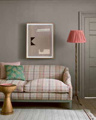 dusky grey-green room with a sofa in Jane churchill J0188-03 Oxana Check, red/green