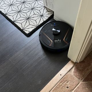 robot vacuum in corner