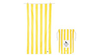 Yellow and white striped beach towel with matching bag