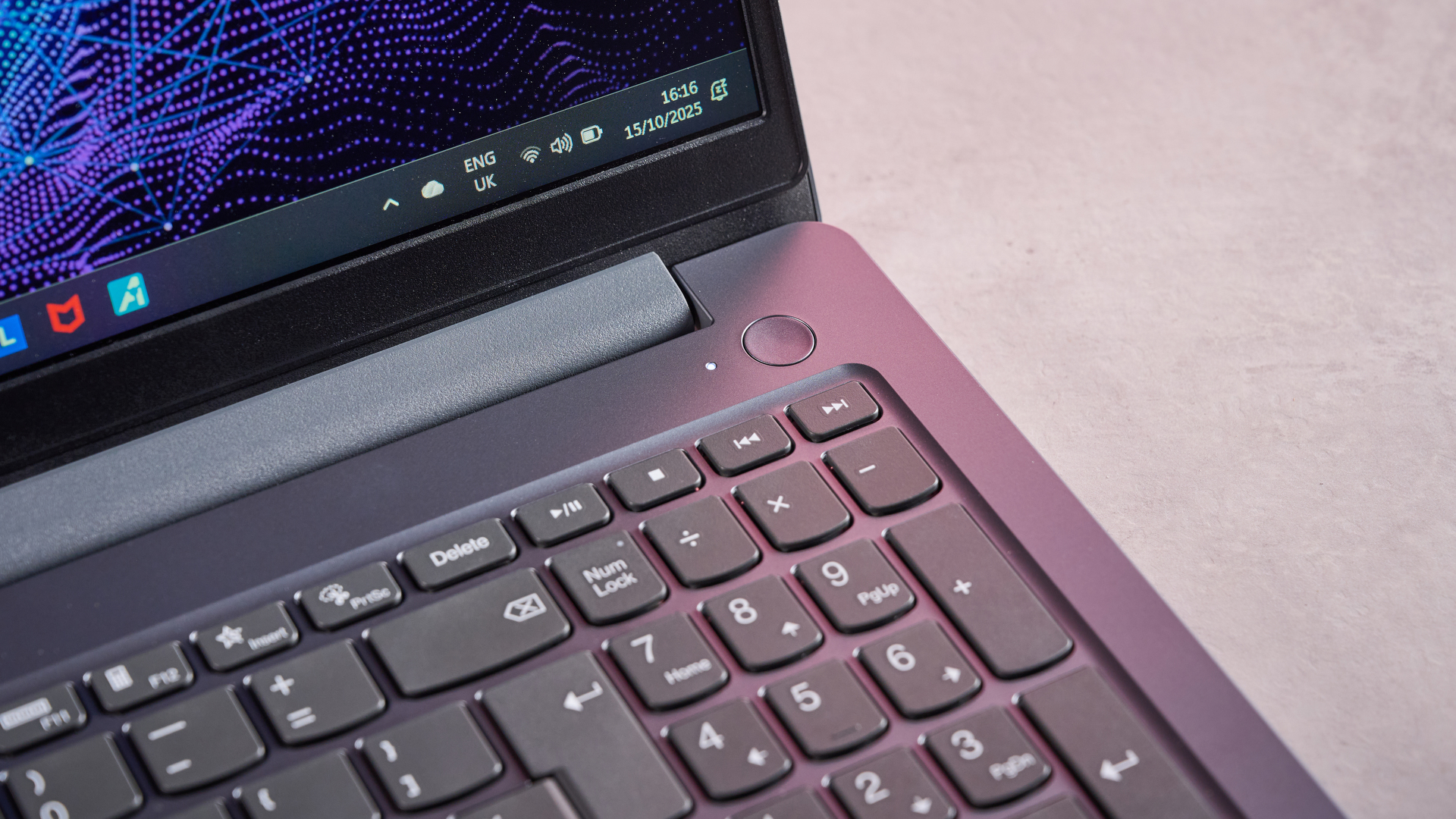 Close-up of number pad and power button on Lenovo LOQ Essential Gen 9, open on desk