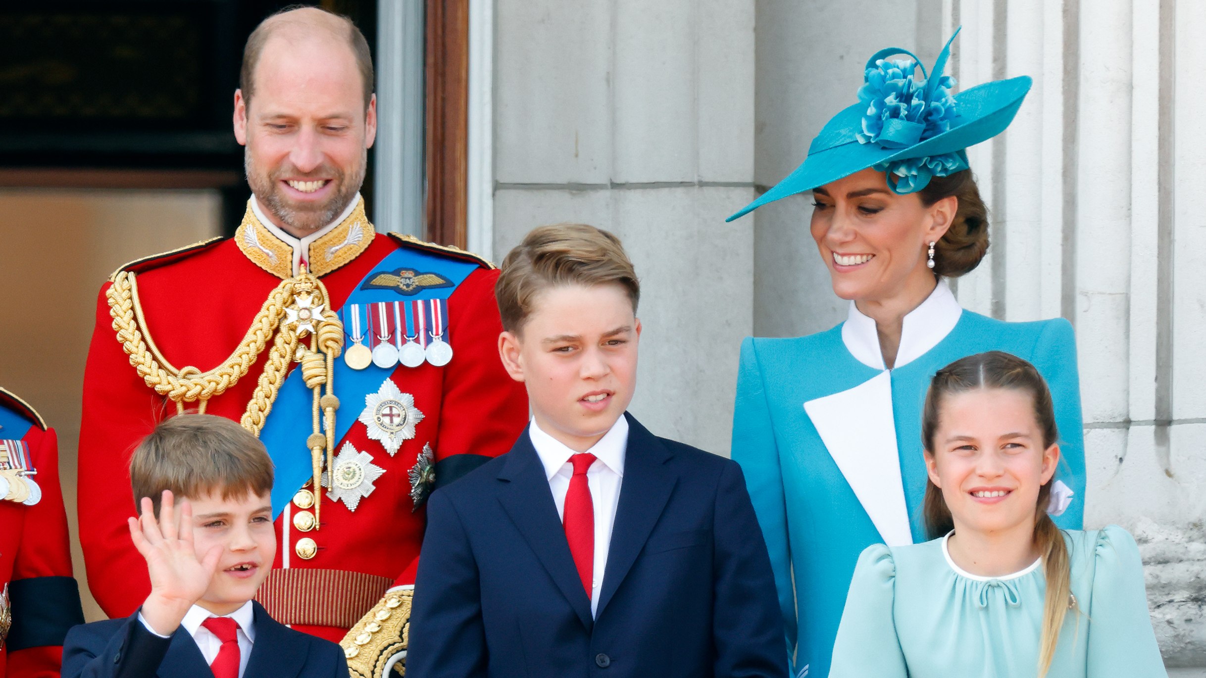 Prince William, Prince Louis, Prince George, Catherine, Princess of Wales and Princess Charlotte watch an RAF flypast from the balcony of Buckingham Palace after attending Trooping The Colour 2025 on June 14, 2025
