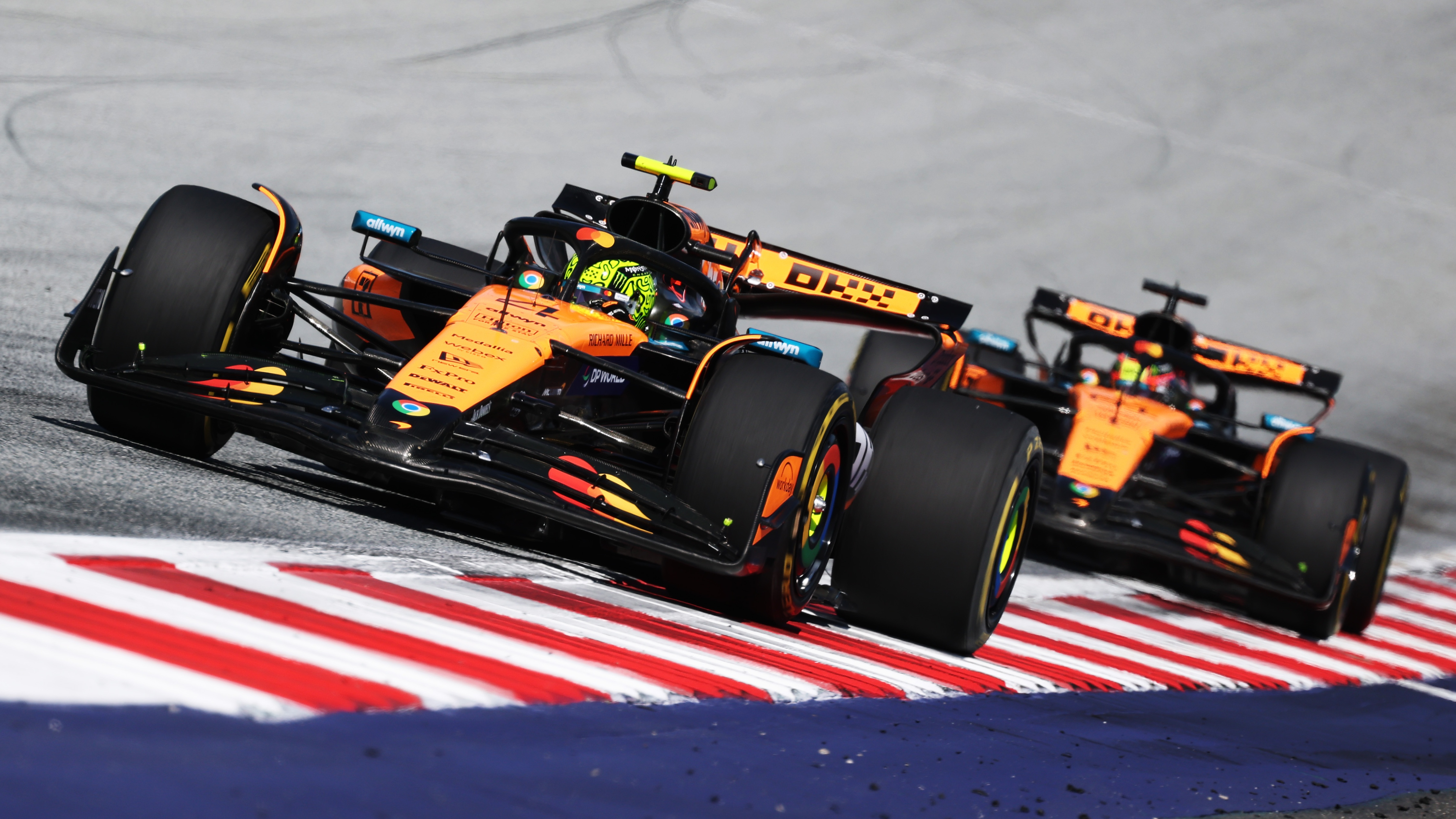 Lando Norris and Oscar Piastri racing for McLaren