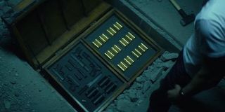 John Wick gold coins in briefcase