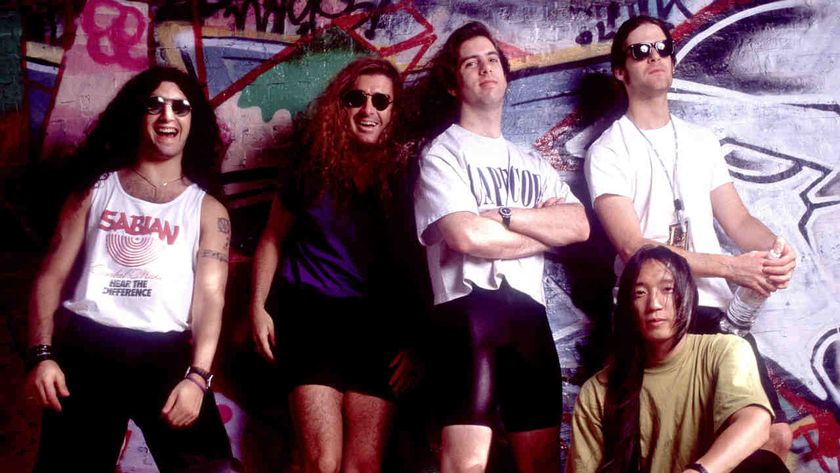Dream Theater posing for a photograph in front of a graffiti&rsquo;d wall in 1992