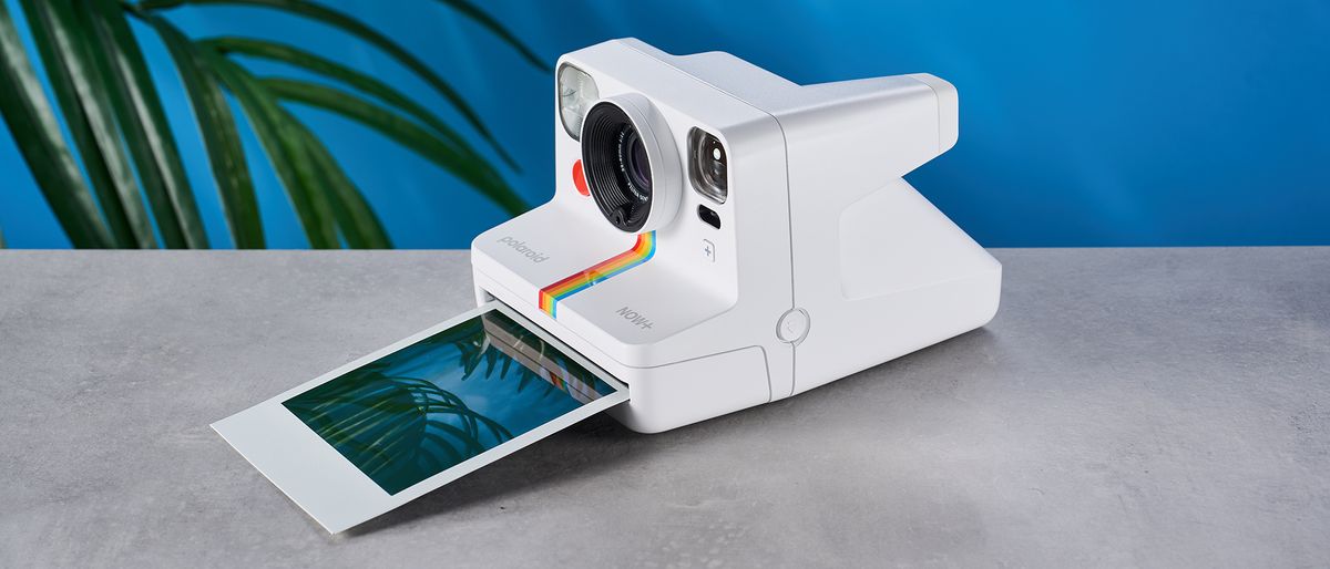 A white Polaroid Now+ Gen 2 instant camera