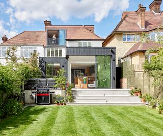 Modern timber clad extension to a ground floor and loft extension