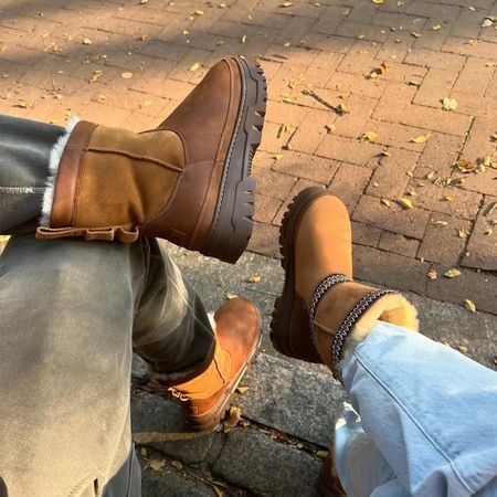 Two pairs of Ugg boots on a fall day.