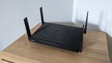 Linksys Hydra Pro 6E from the front on a table
