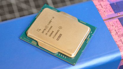An Intel Core i9-14900K with its promotional packaging