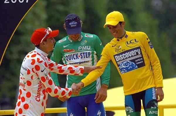 The polka-dot arm grabs the yellow as the celebrations make the round.