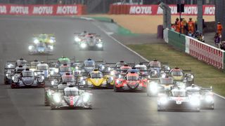 How to watch Le Mans 2021 - Image shows cars lined up the beginning of Le Mans 2020.