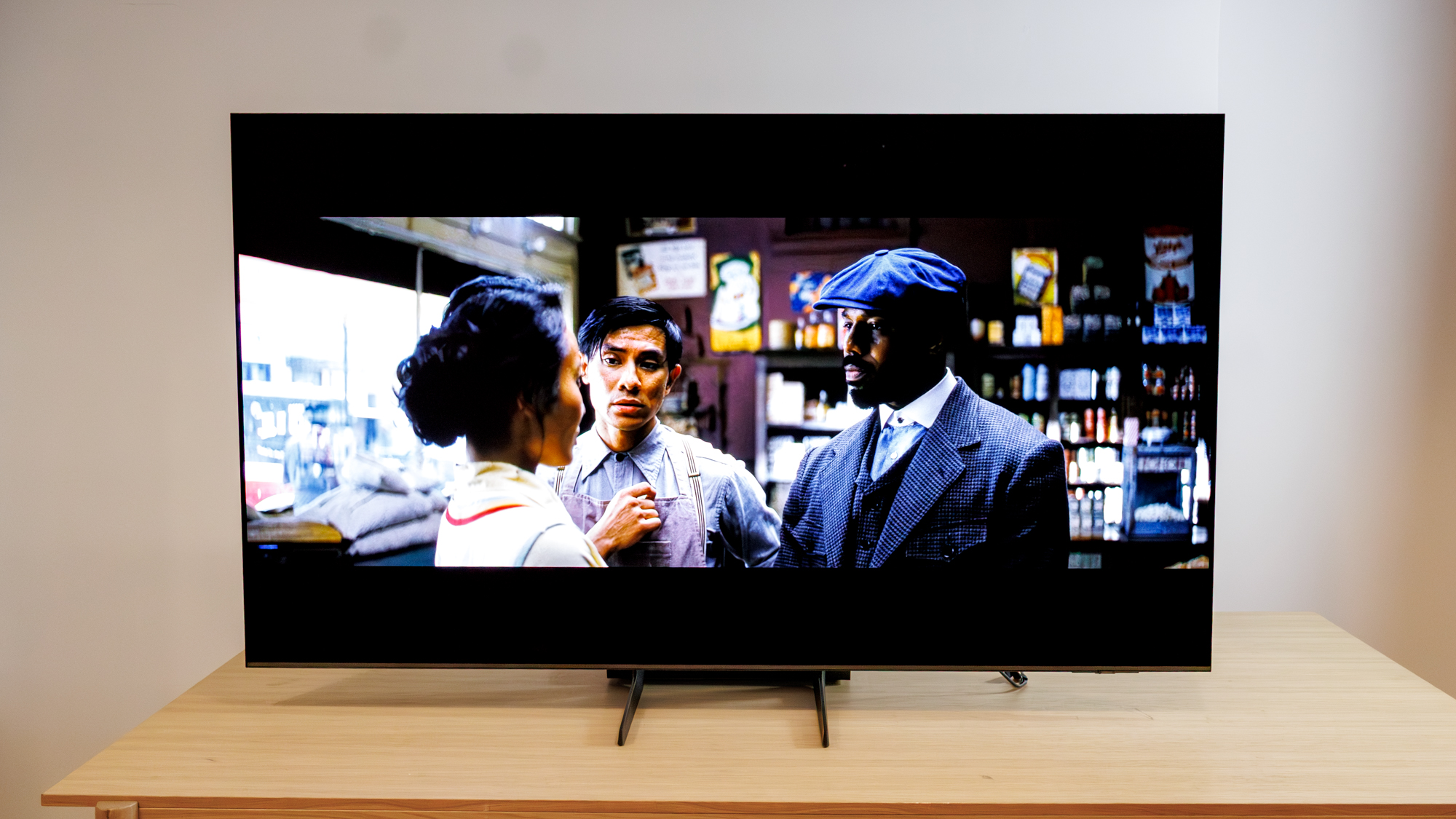 Samsung OLED S85F TV on a table