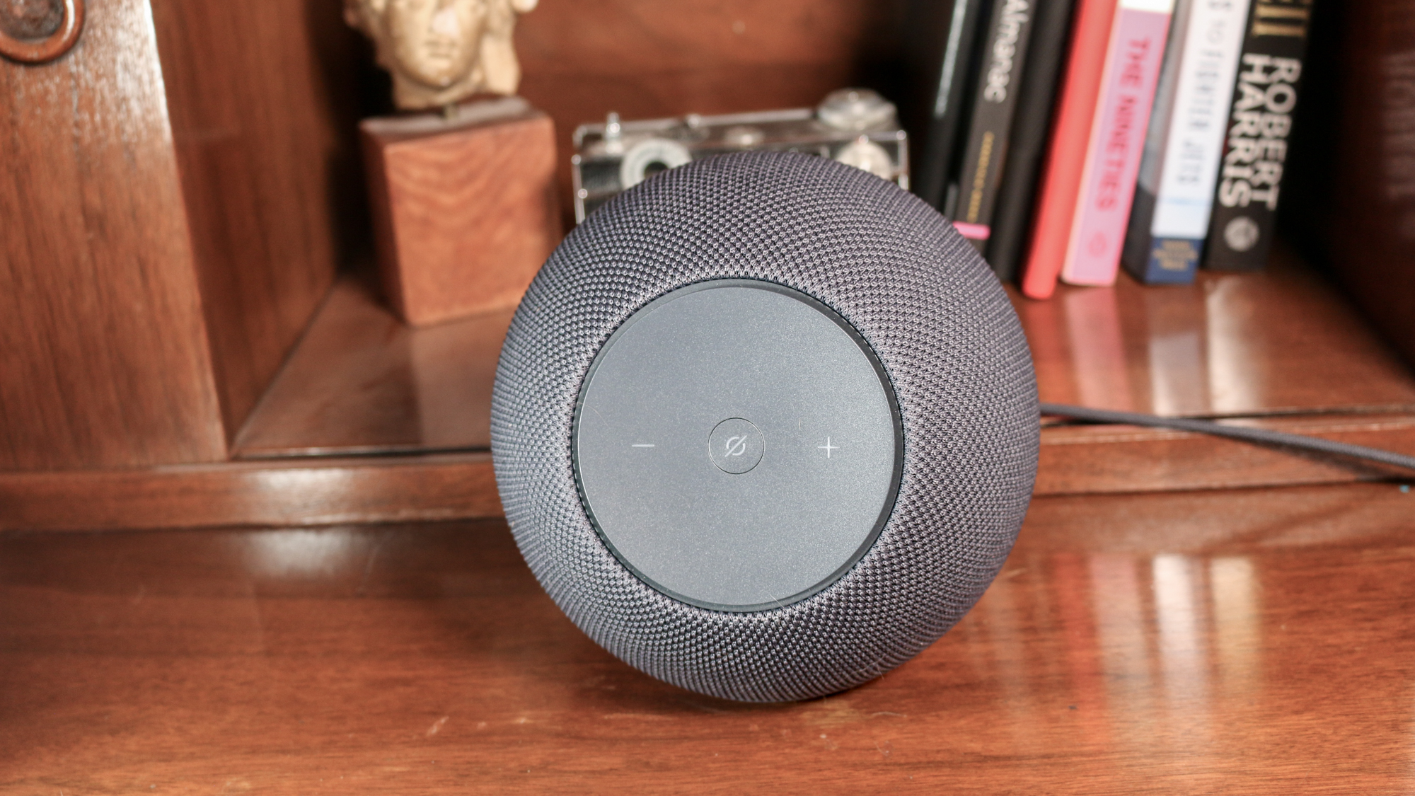 Amazon Echo Studio on a book shelf