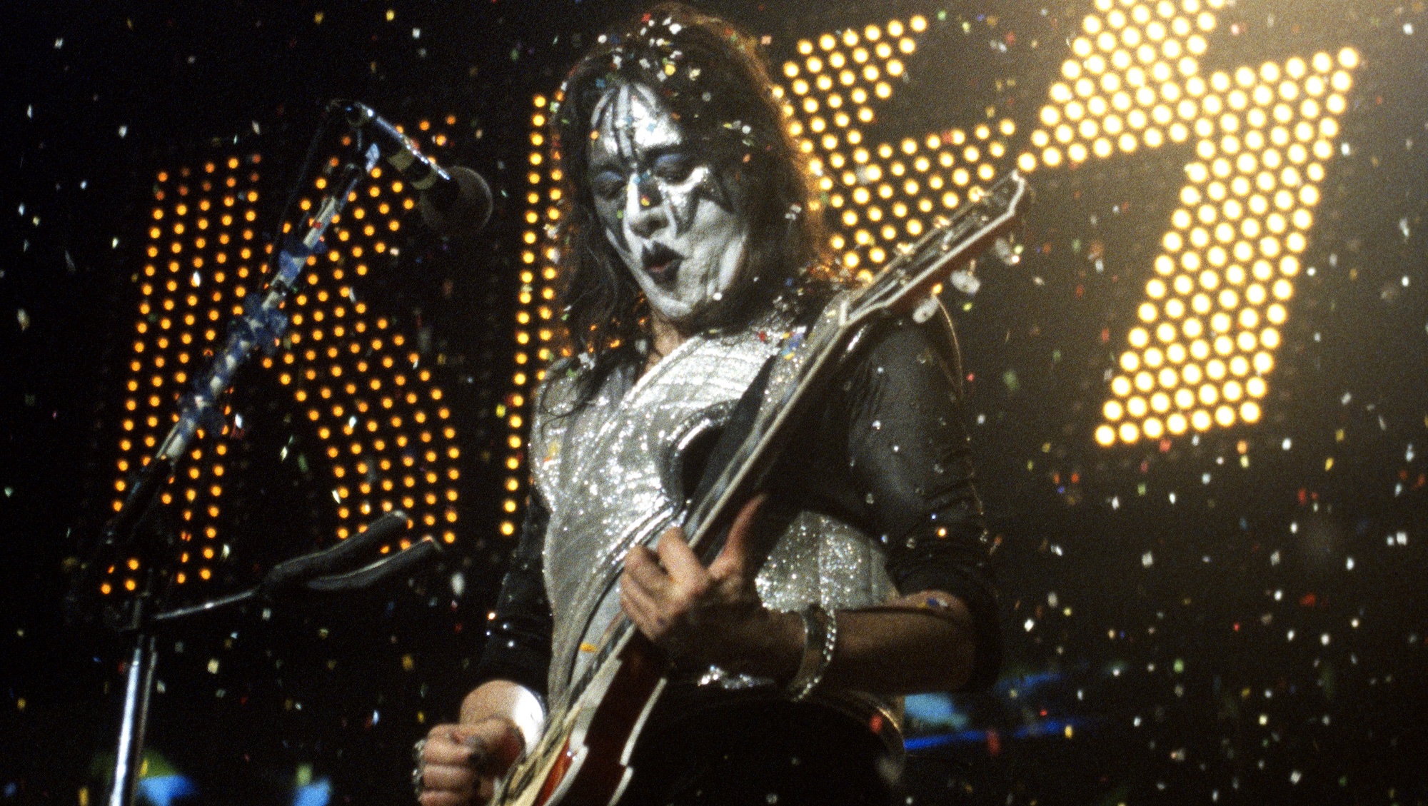 Ace Frehley performs onstage with Kiss at the Arco Arena in Sacramento, California on August 28, 1996
