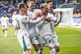 Borussia Monchengladbach players celebrate a goal against Hoffenheim in April 2024.