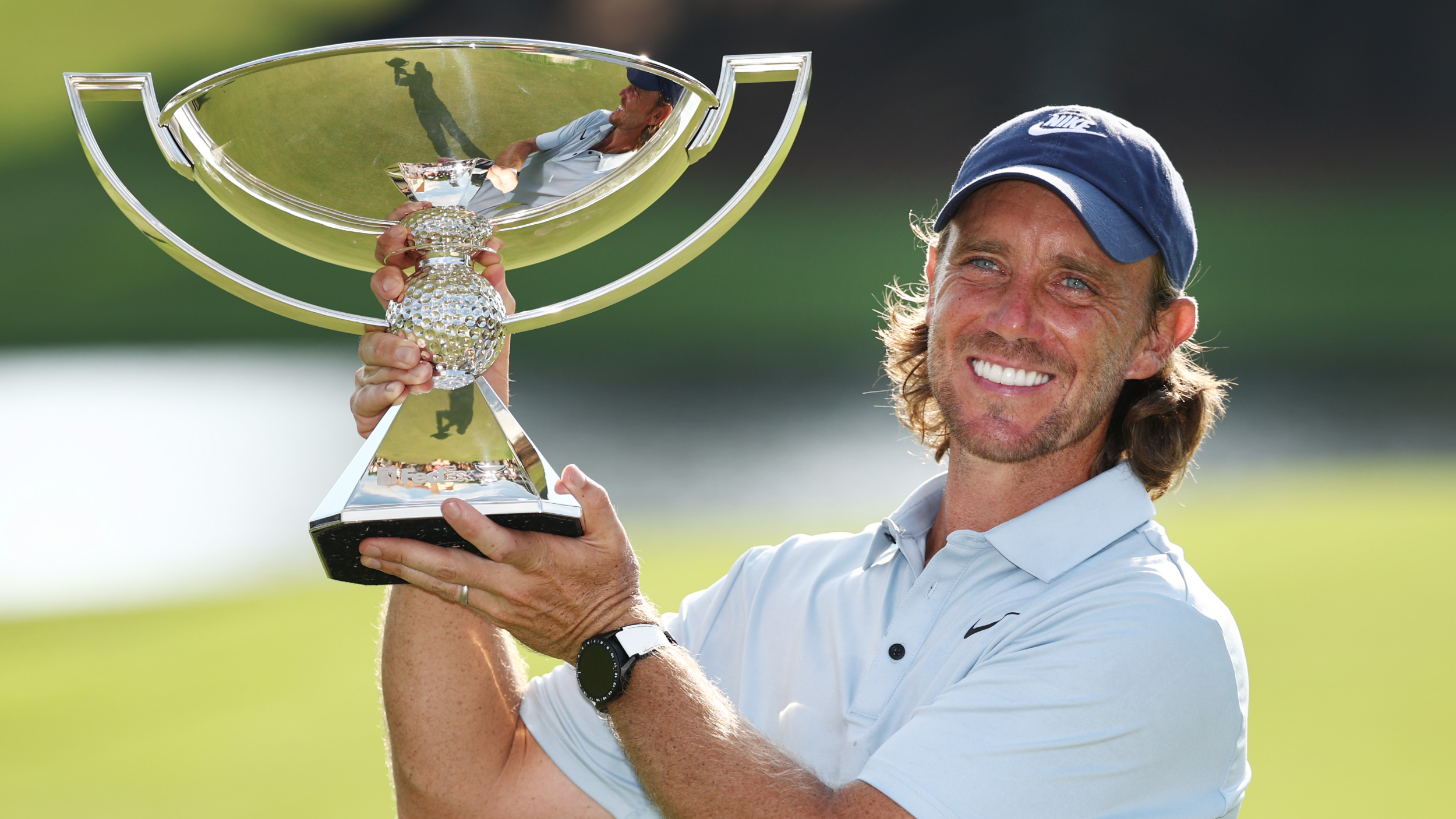 Tommy Fleetwood with the FedEx Cup trophy 