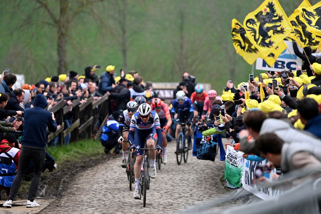 OUDENAARDE BELGIUM APRIL 02 Kasper Asgreen of Denmark and Team Soudal QuickStep competes at Paterberg cobblestones sector during the 107th Ronde van Vlaanderen Tour des Flandres 2023 Mens Elite a 2734km one day race from Brugge to Oudenaarde UCIWT on April 02 2023 in Brugge Belgium Photo by Tim de WaeleGetty Images
