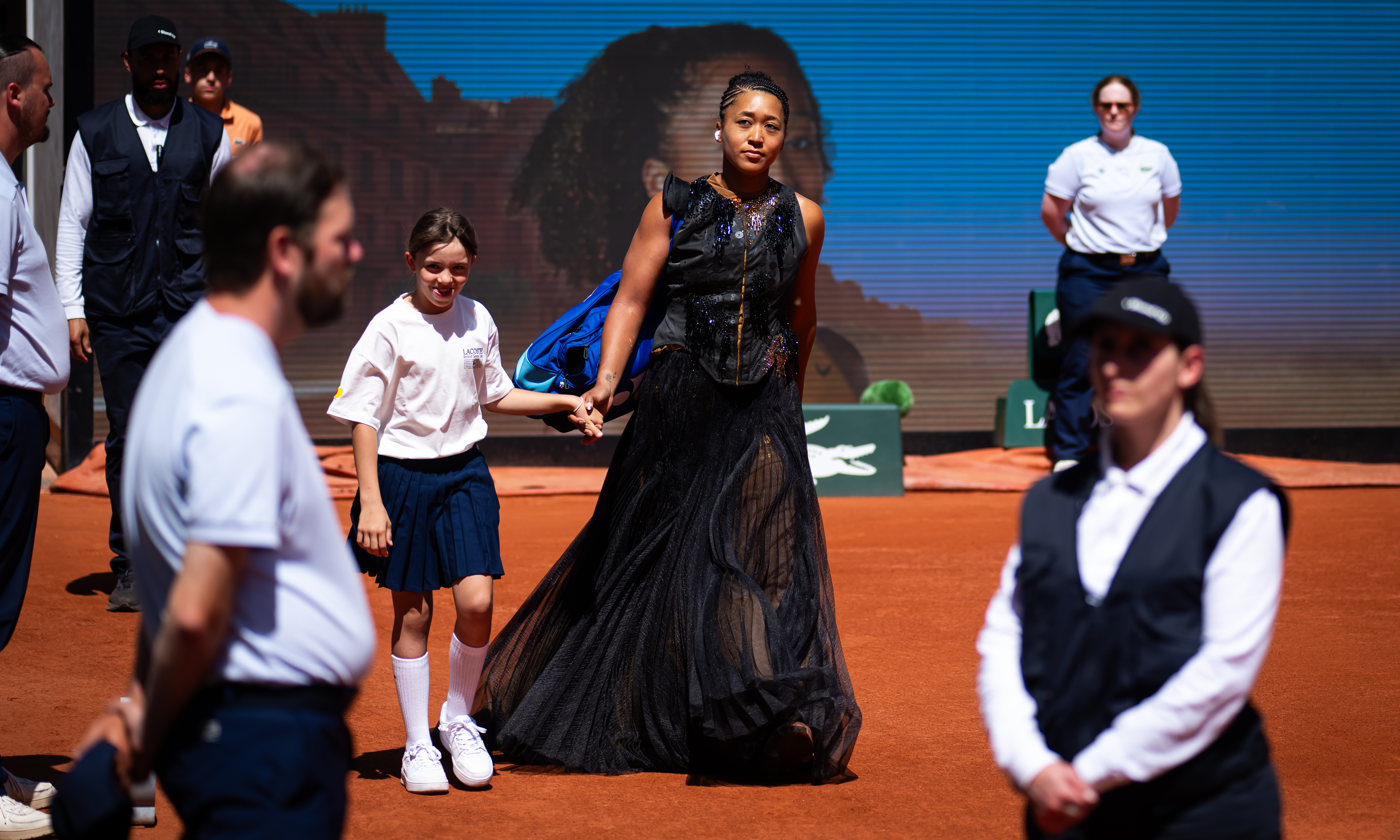 Naomi Osaka won her match at the French Open in a sequin Nike dress and a tennis outfit from Germanier