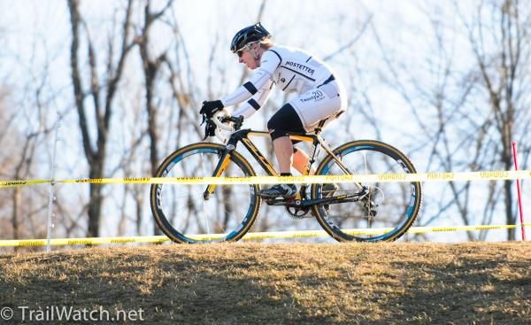 Laura Van Gilder (C3 Athletes Serving Athletes) riding on top of the ridge