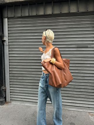 Iris Law wearing Saint Laurent 'Y' bag