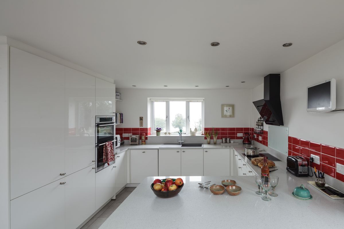 red and white kitchen in self build home