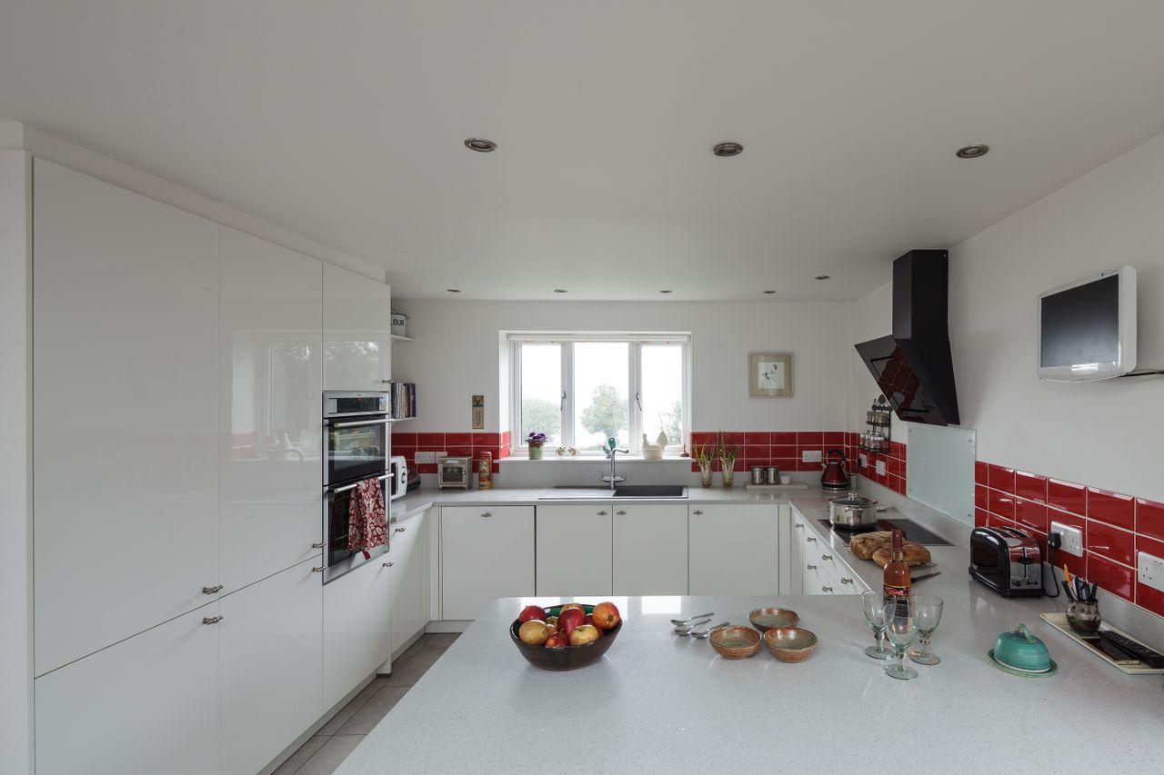 red and white kitchen in self build home