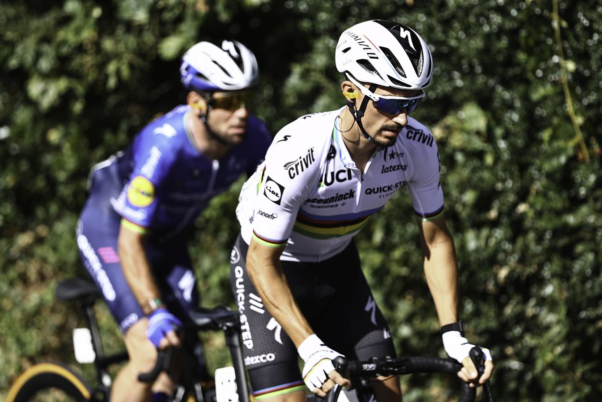 Picture by SWpix.com - 08/09/2021 - Cycling - AJ Bell Tour of Britain Stage 4 - Aberaeron to Great Orme, Llandudno, England - Deceuninck Quick-Step's Juliane Alaphilippe rides with Mark Cavendish.