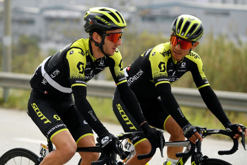 Adam Yates and Esteban Chaves chat in the peloton