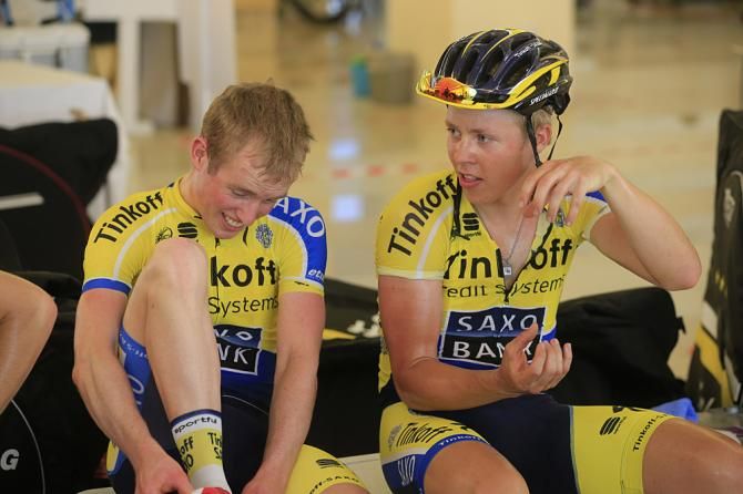 Tinkoff-Saxo riders wait for their bikes