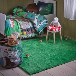 Children's bedroom decked out in SKOGSDUVA collection.