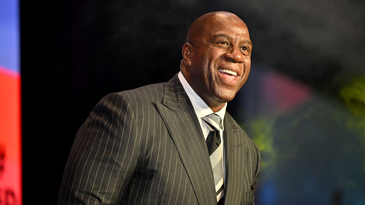 How has Magic Johnson survived with HIV?