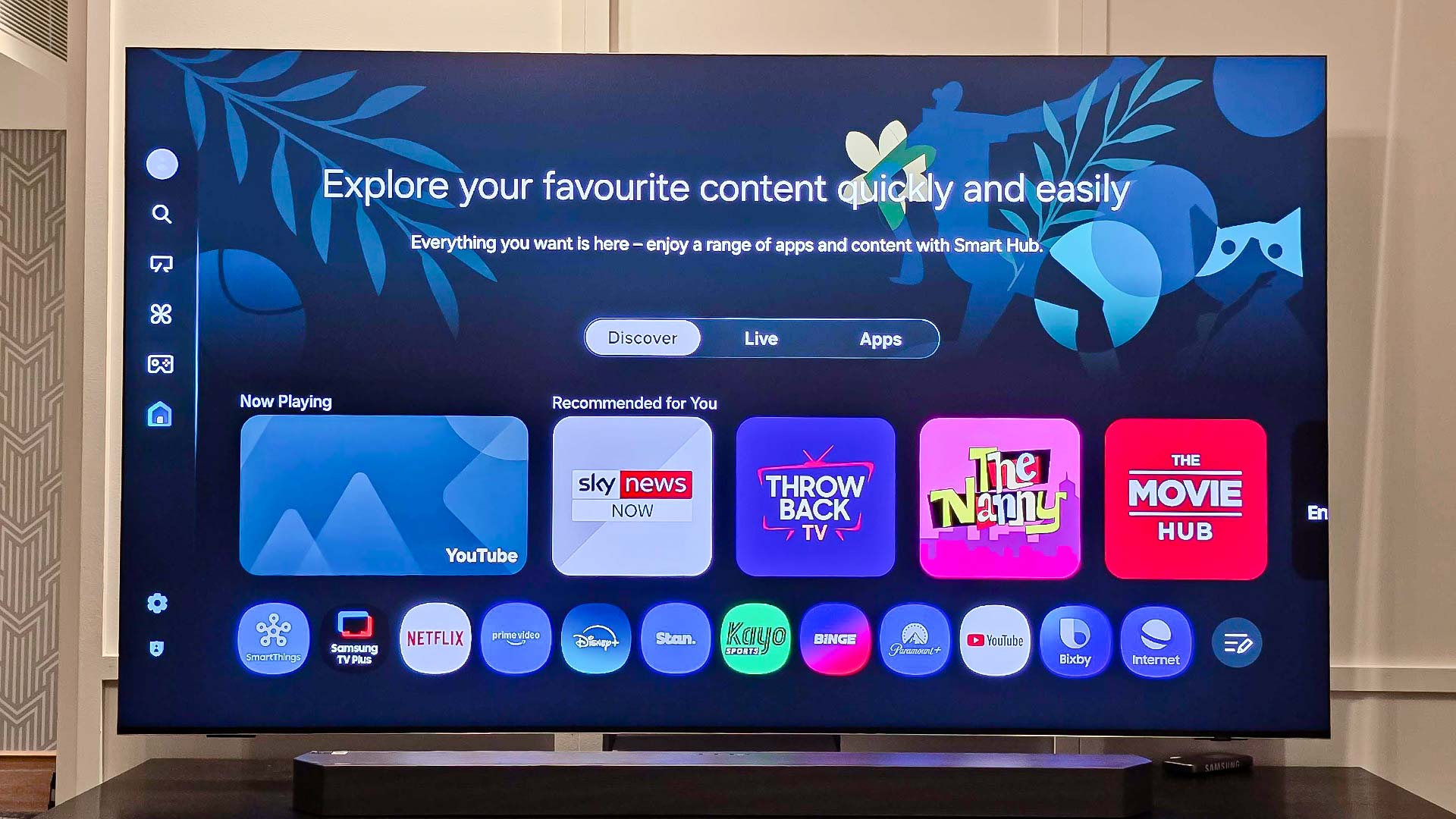 The home screen for a Samsung QN990F TV.