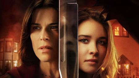 Scream 7 poster showing Sydney and daughter Tatum on either side of a knife with Ghostface reflected in the blade