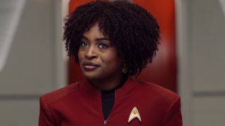 Uhura hanging out at the conference table