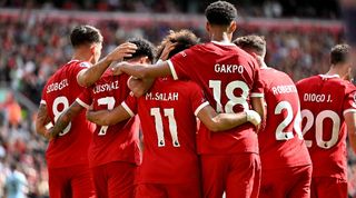 Newcastle vs Liverpool live stream Mohamed Salah celebrates with his Liverpool team-mates after scoring against Bournemouth at Anfield in the Premier League in August 2023.